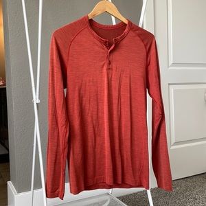 Lululemon long sleeve tee with button front.